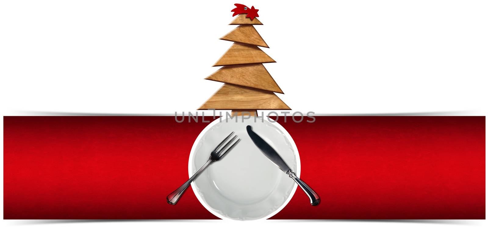 Two red velvet backgrounds with empty white plate, silver cutlery and wooden Christmas tree with red comet. Template for a Christmas food menu
