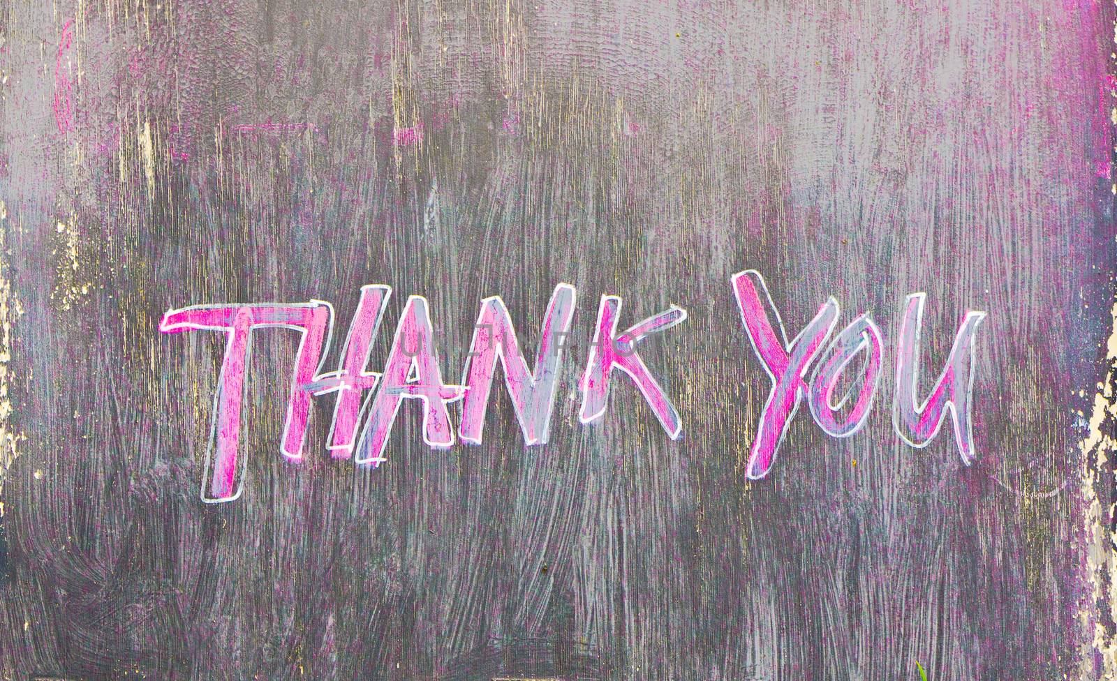 Thank you painted on a black wooden board