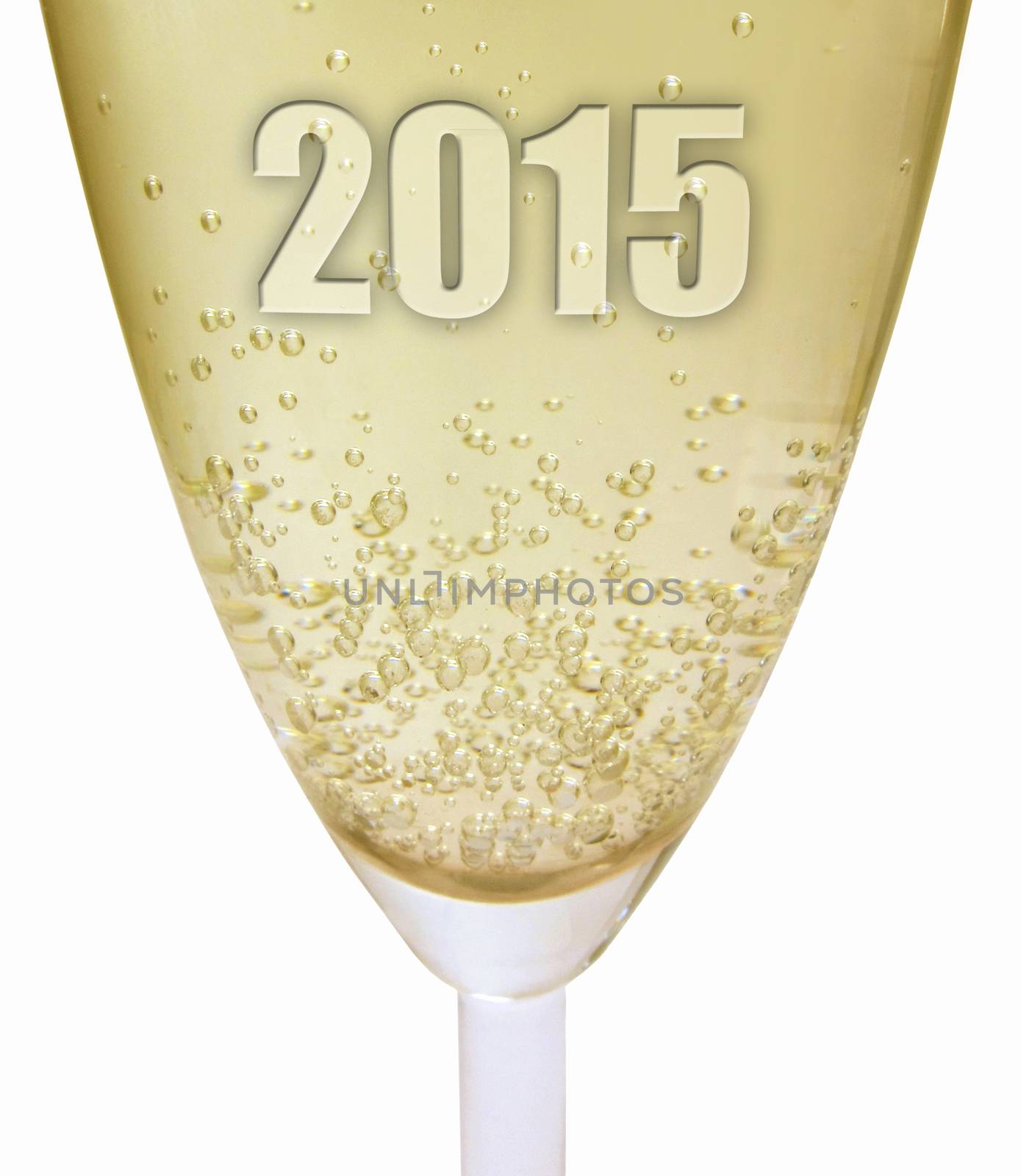 Closeup of a glass of freshly poured champagne with 2015