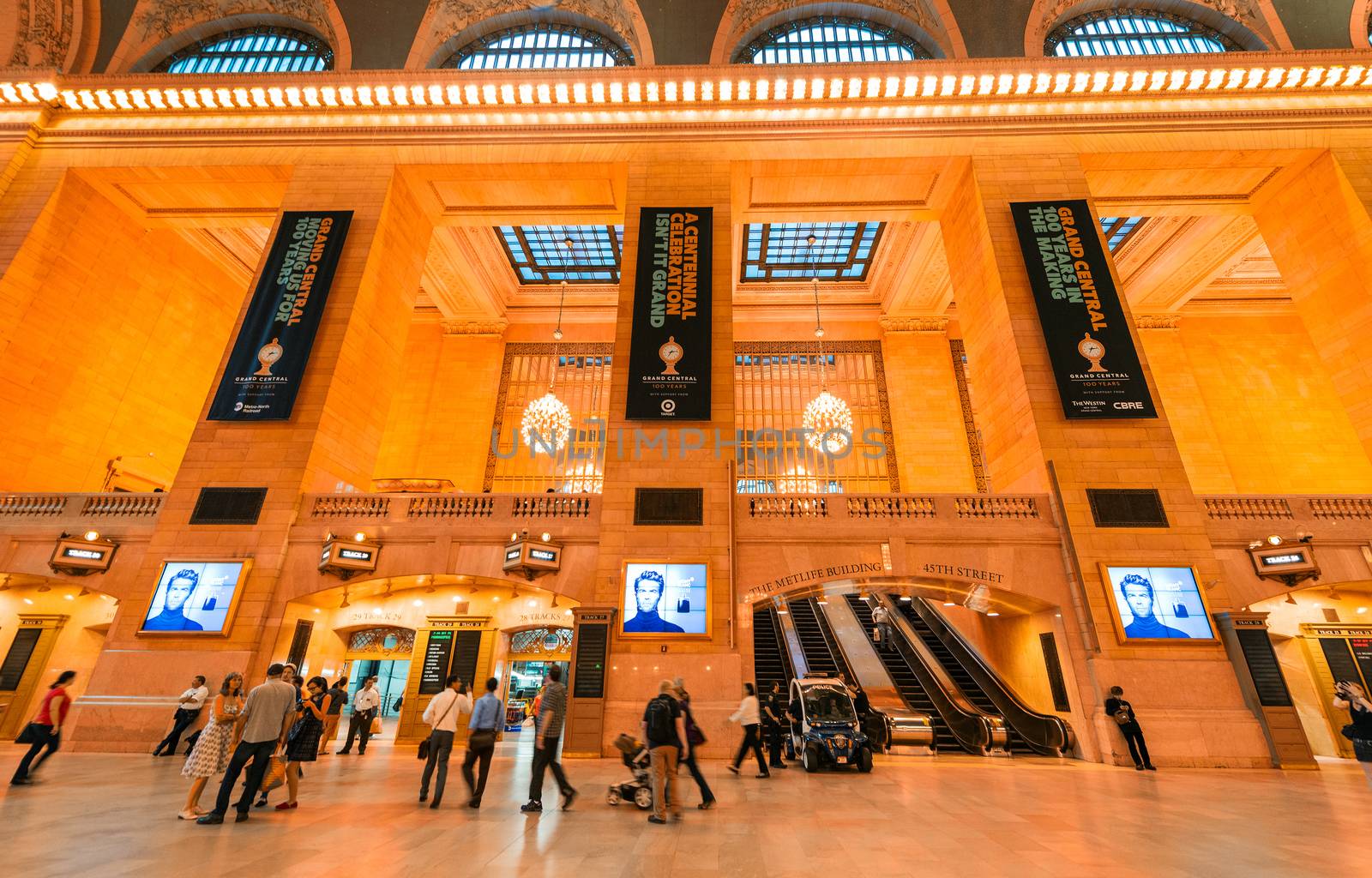 NEW YORK, MAY 14: Commuters and tourists in the grand central station in May 14, 2013 in New York. It is the largest train station in the world by number of platforms: 44, with 67 tracks.