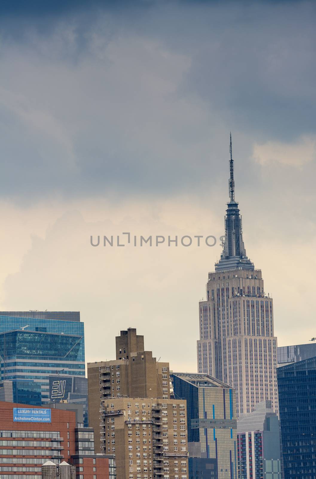 NEW YORK - MAY 11: The Empire State Building, view from rooftop, May 11, 2013 in New York, USA. The Empire State Building is a 102-story landmark and American cultural icon in New York.