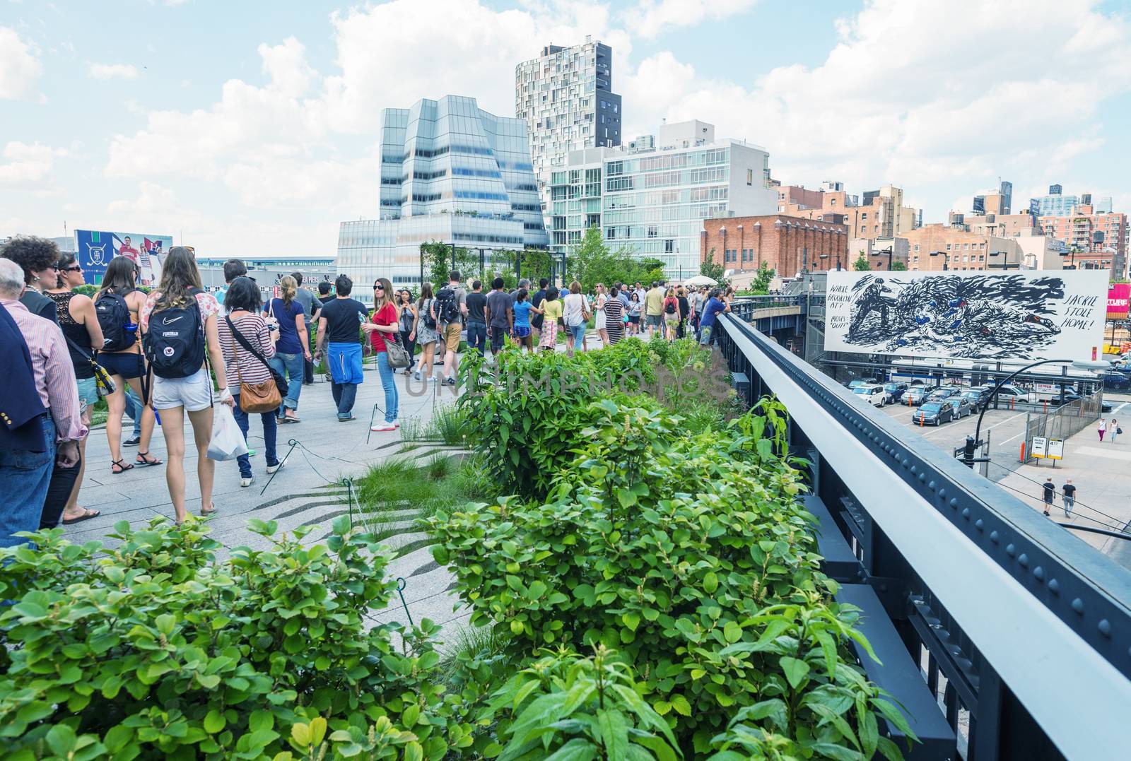 NEW YORK - CIRCA MAY 2013: The High Line Park, New York, circa May 2013. The High Line is a popular linear park built on the elevated train tracks above Tenth Ave in New York City