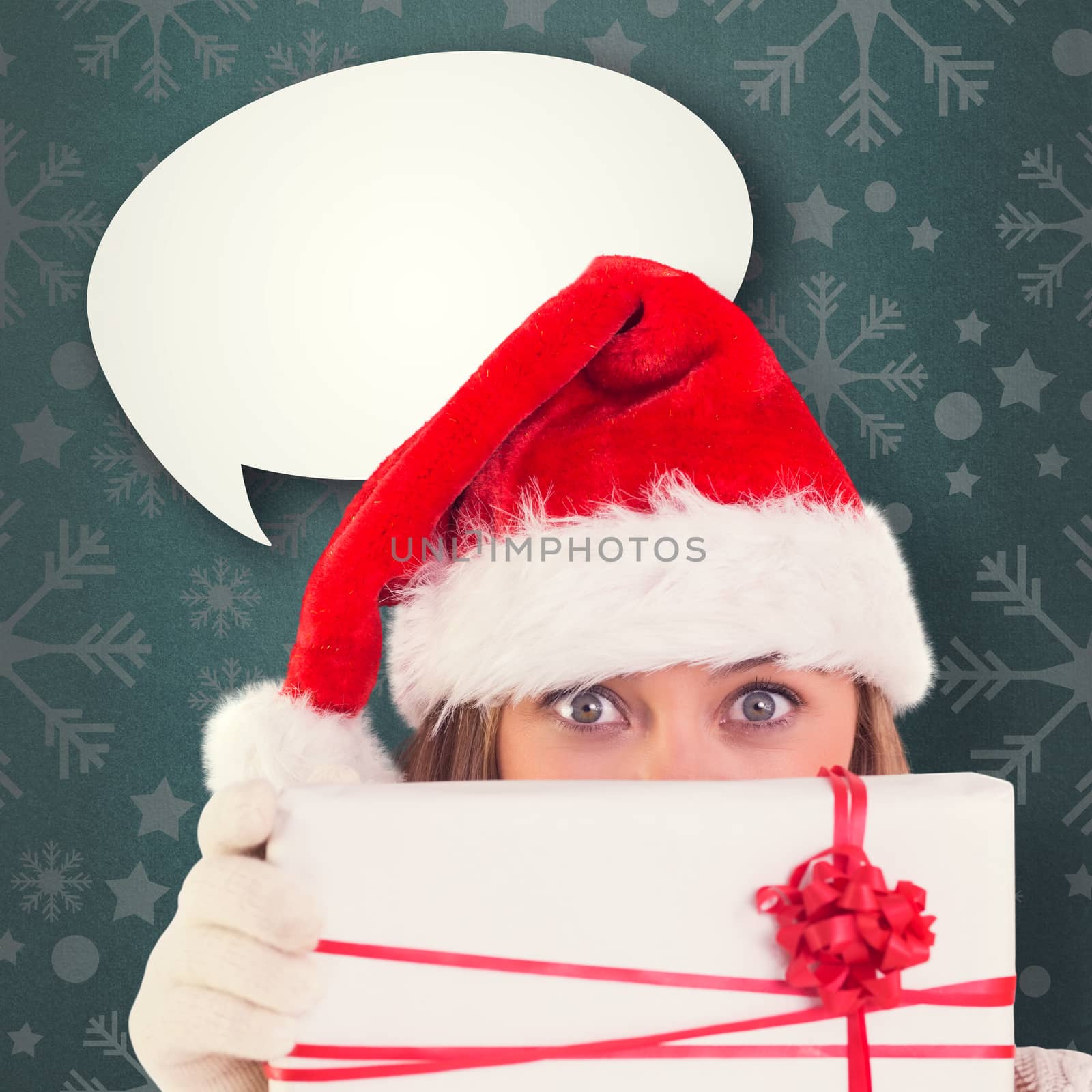 Composite image of festive blonde holding a gift by Wavebreakmedia