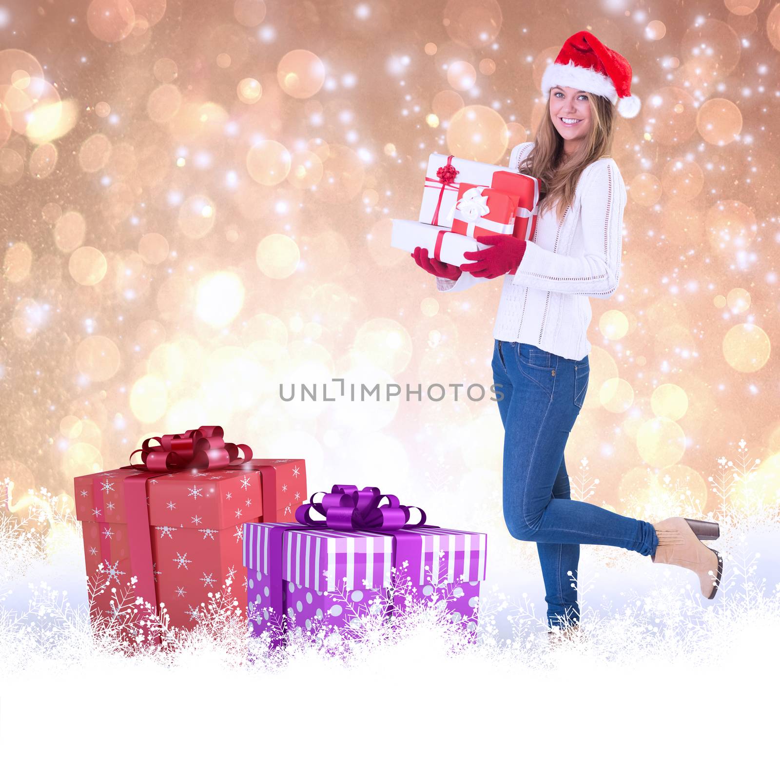 Festive blonde holding pile of gifts against yellow abstract light spot design