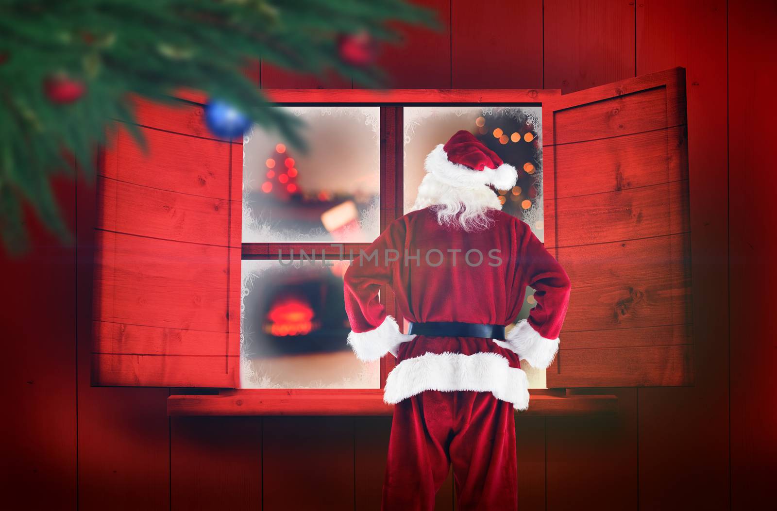 Santa Claus against christmas at home 