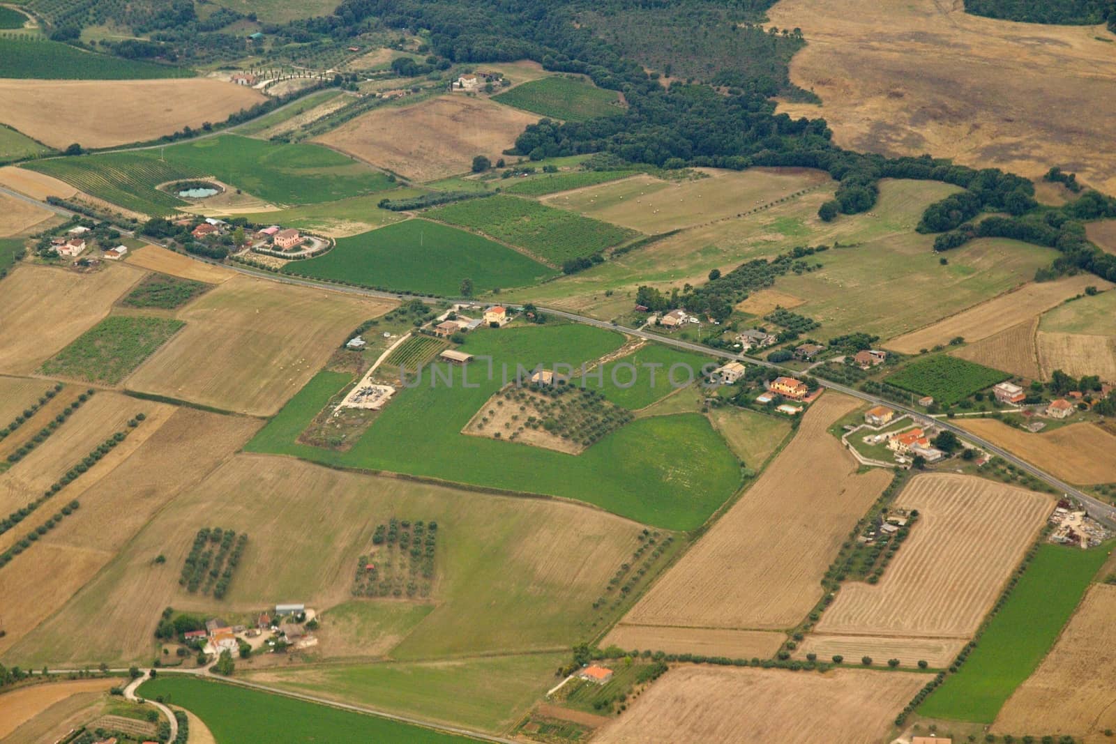 Photo shows Italian landscape taken from the plane.