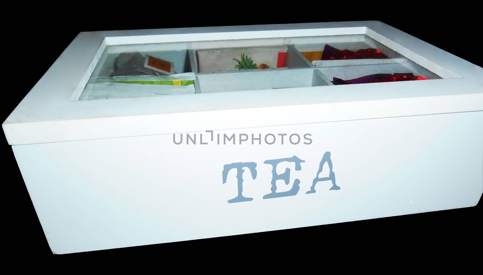 Tea box isolated on black background.

Picture taken on November 10, 2014.