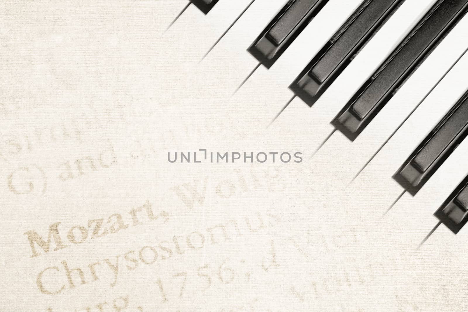 background of mozart text on antique paper with piano keys