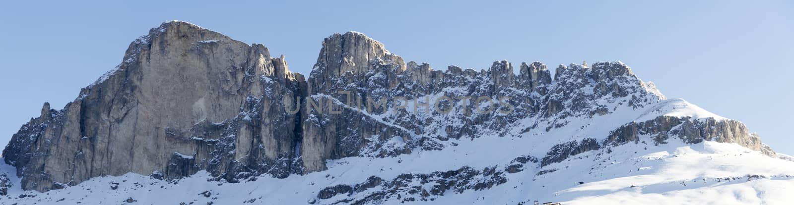 Mountain Catinaccio view from Karersee in winter season, Dolomites