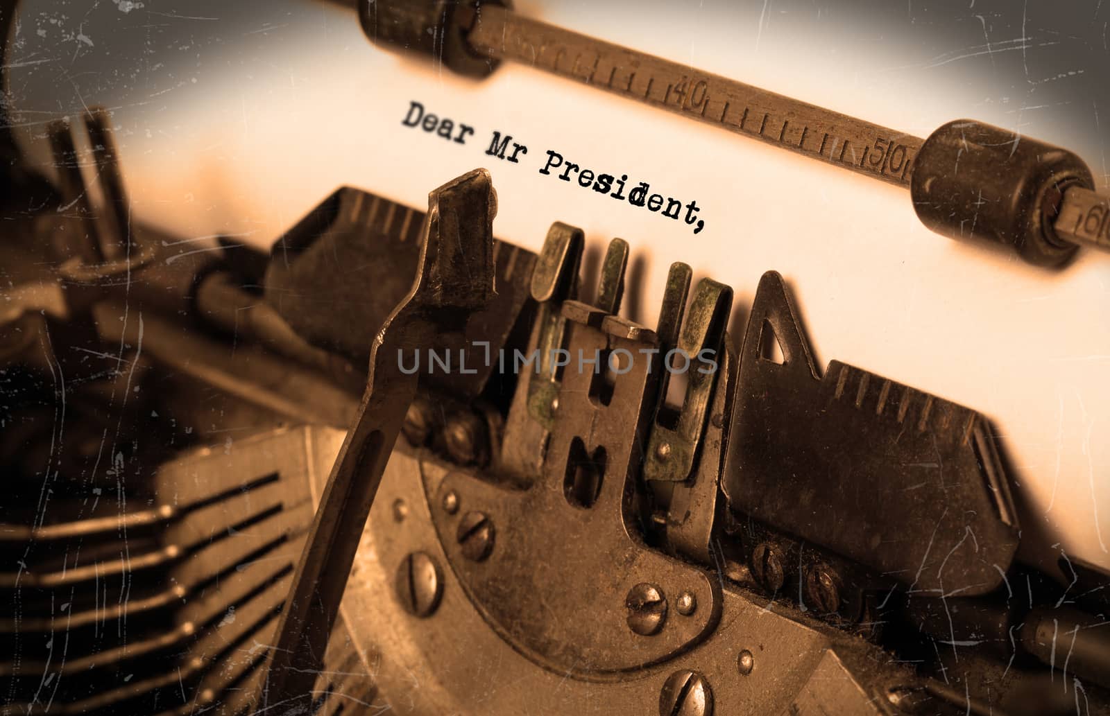 Close-up of an old typewriter with paper, perspective, selective focus, dear mr president