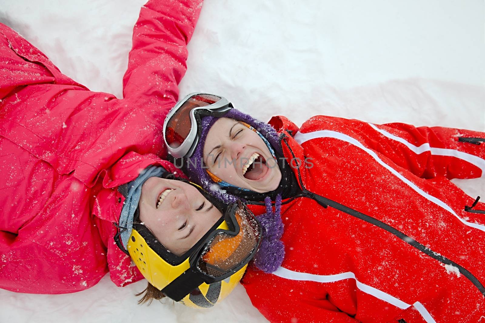 Female skiers relaxing with joy