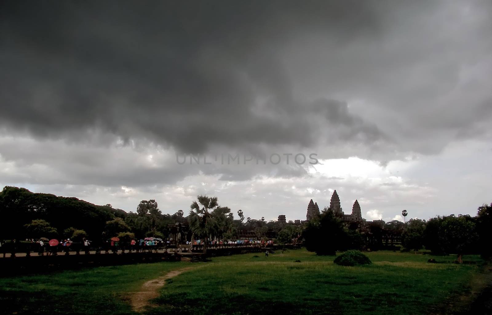 Rain cloud move towards an ancient temple, Angkor Wat, in Siem Reap, Cambodia.