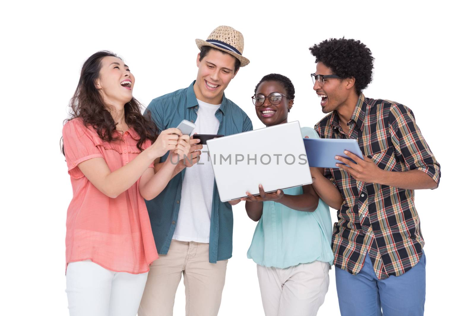 Stylish friends using their technology on white background