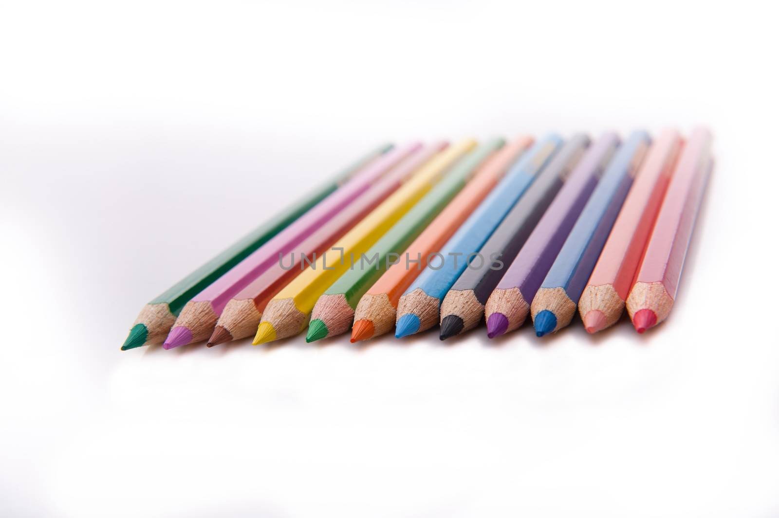 Twelve colored pencils in a row by jetstream4wd