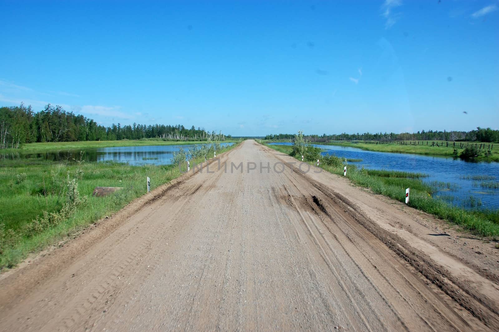 Gravel road Kolyma state highway at outback of Russia by danemo