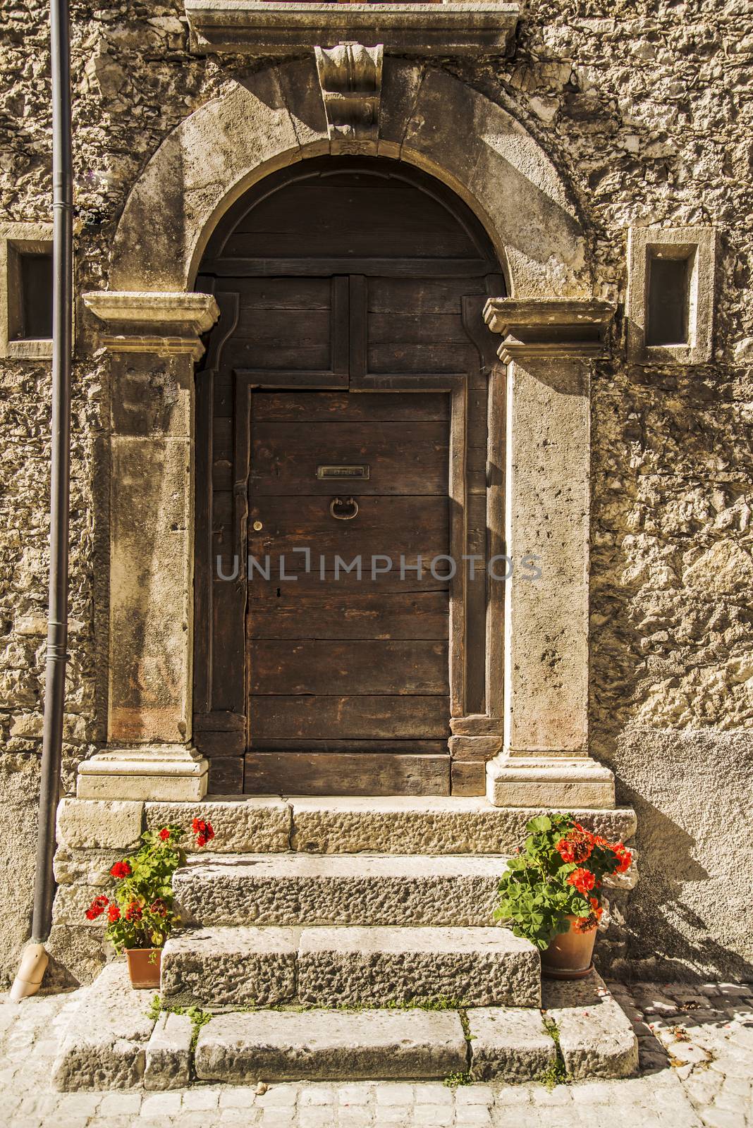 italian door in small village, Italy