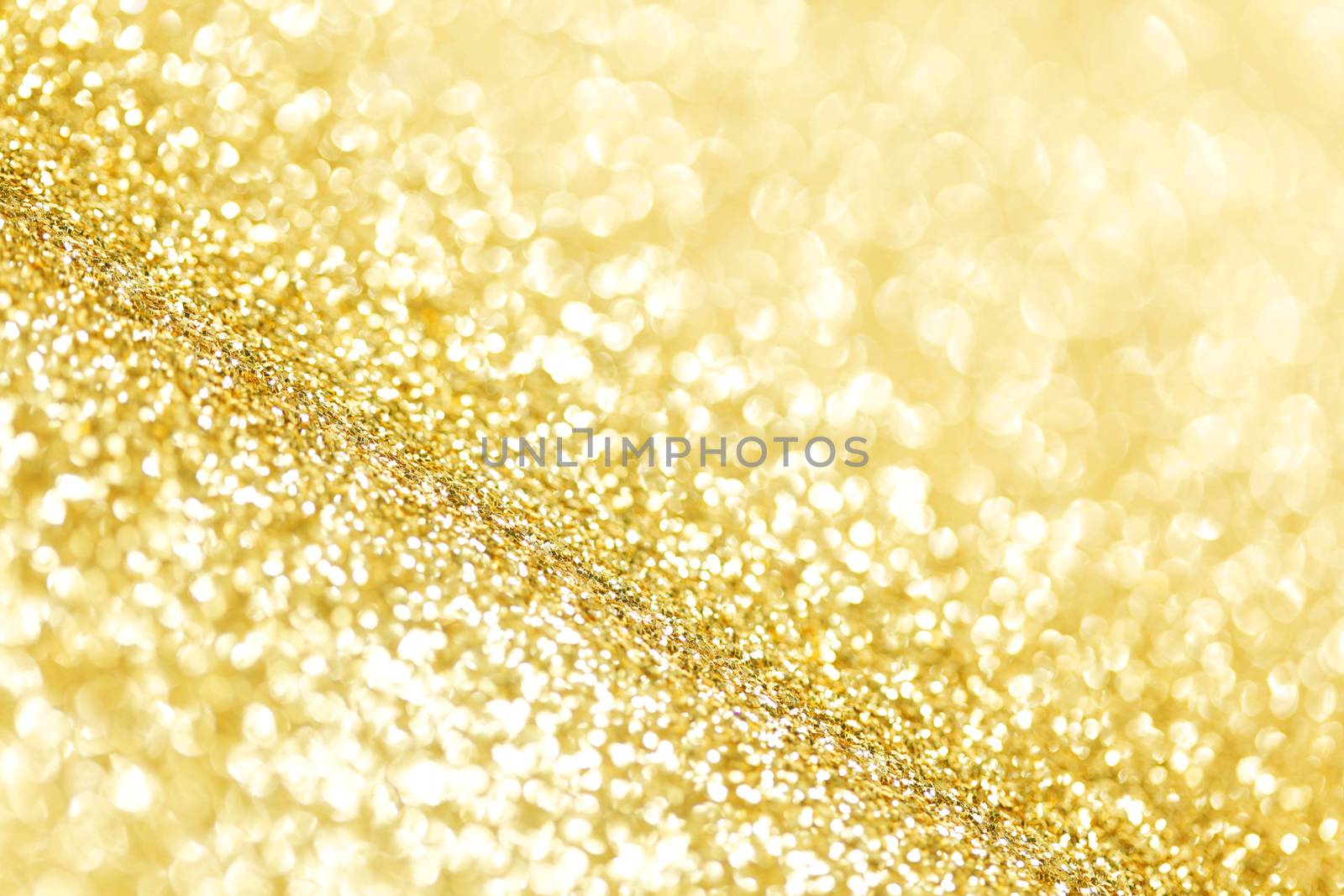 Abstract shining glitters gold holiday bokeh background