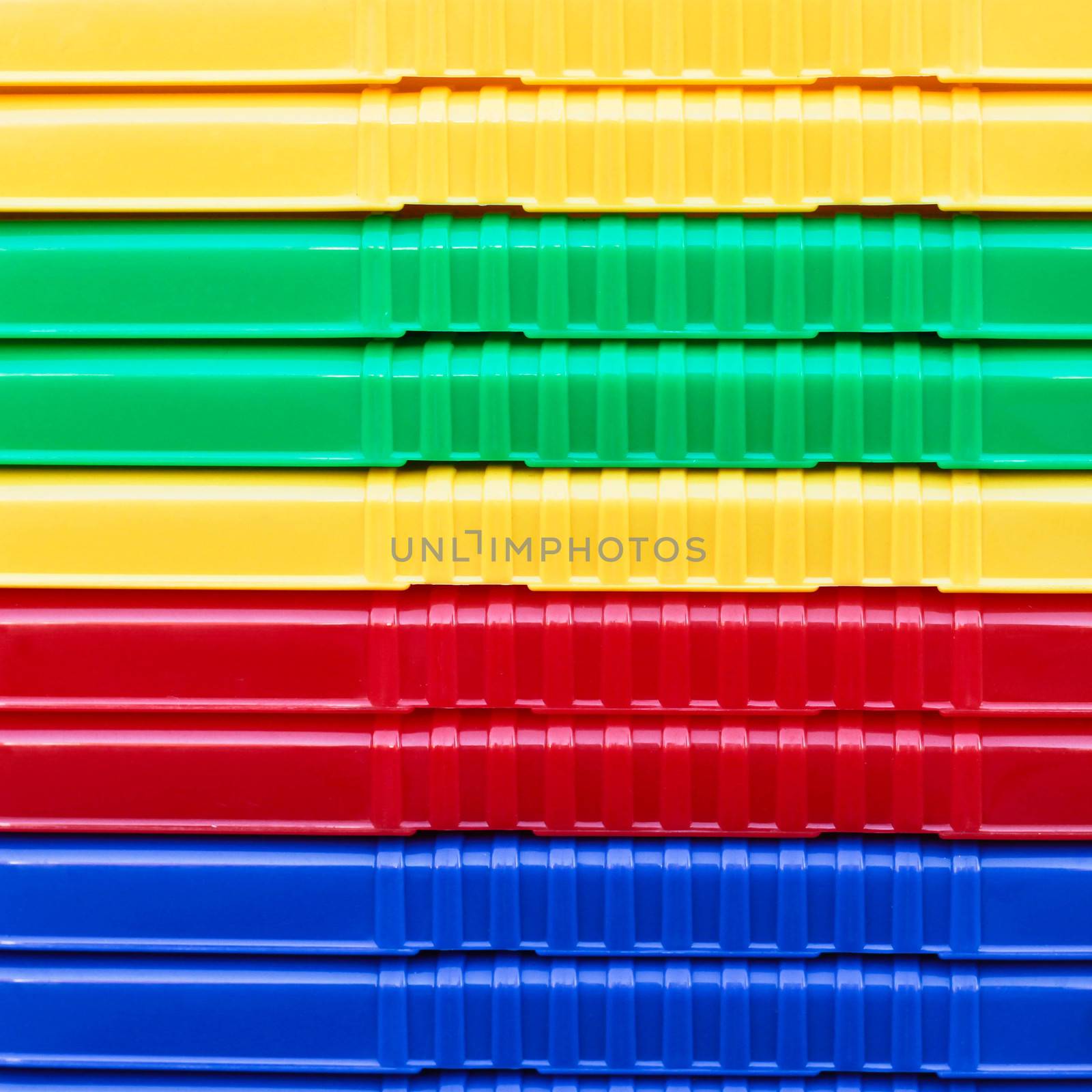 Close up of stacked plastic crates as a background