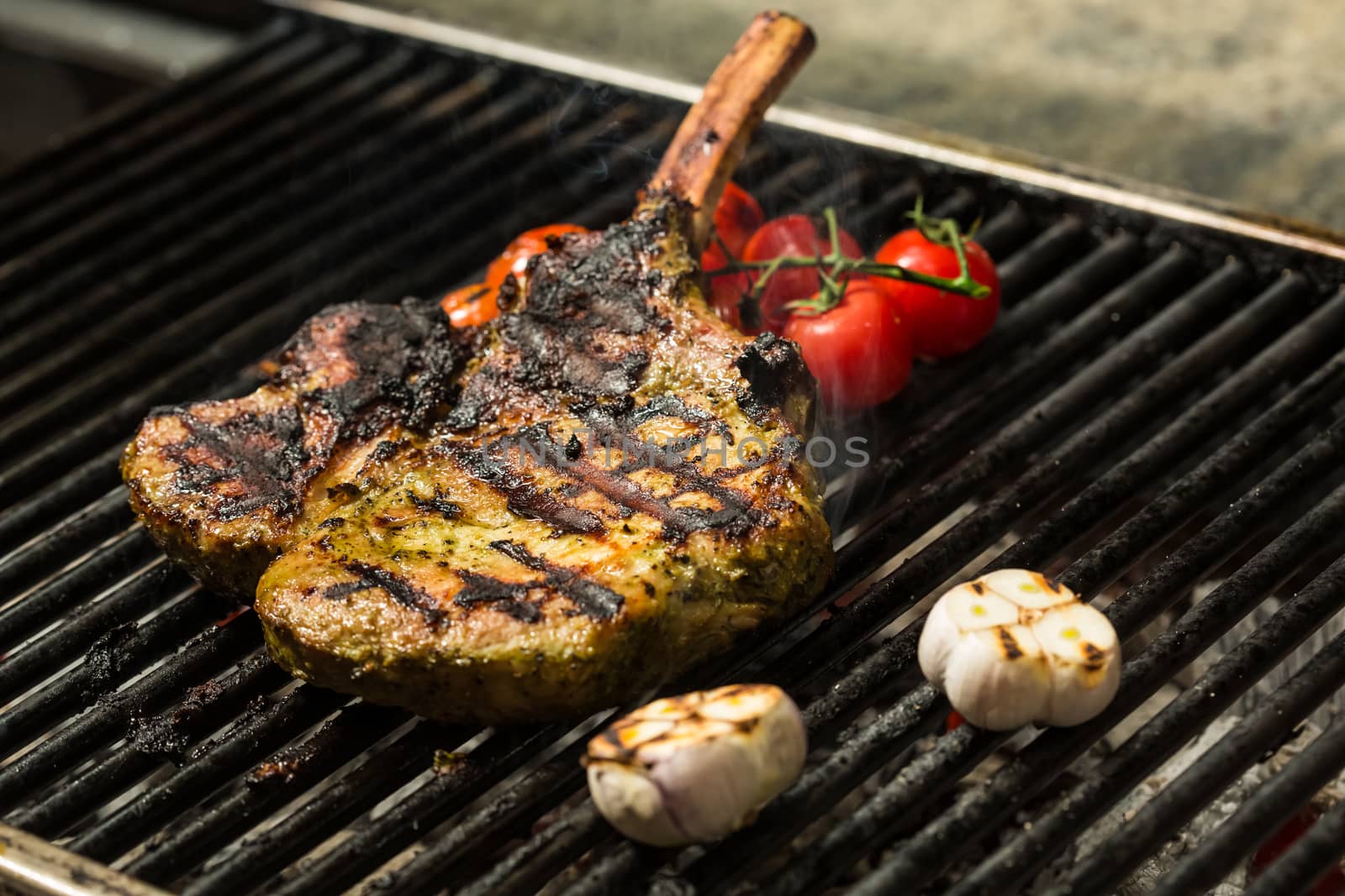 steak flame broiled on a barbecue by sarymsakov