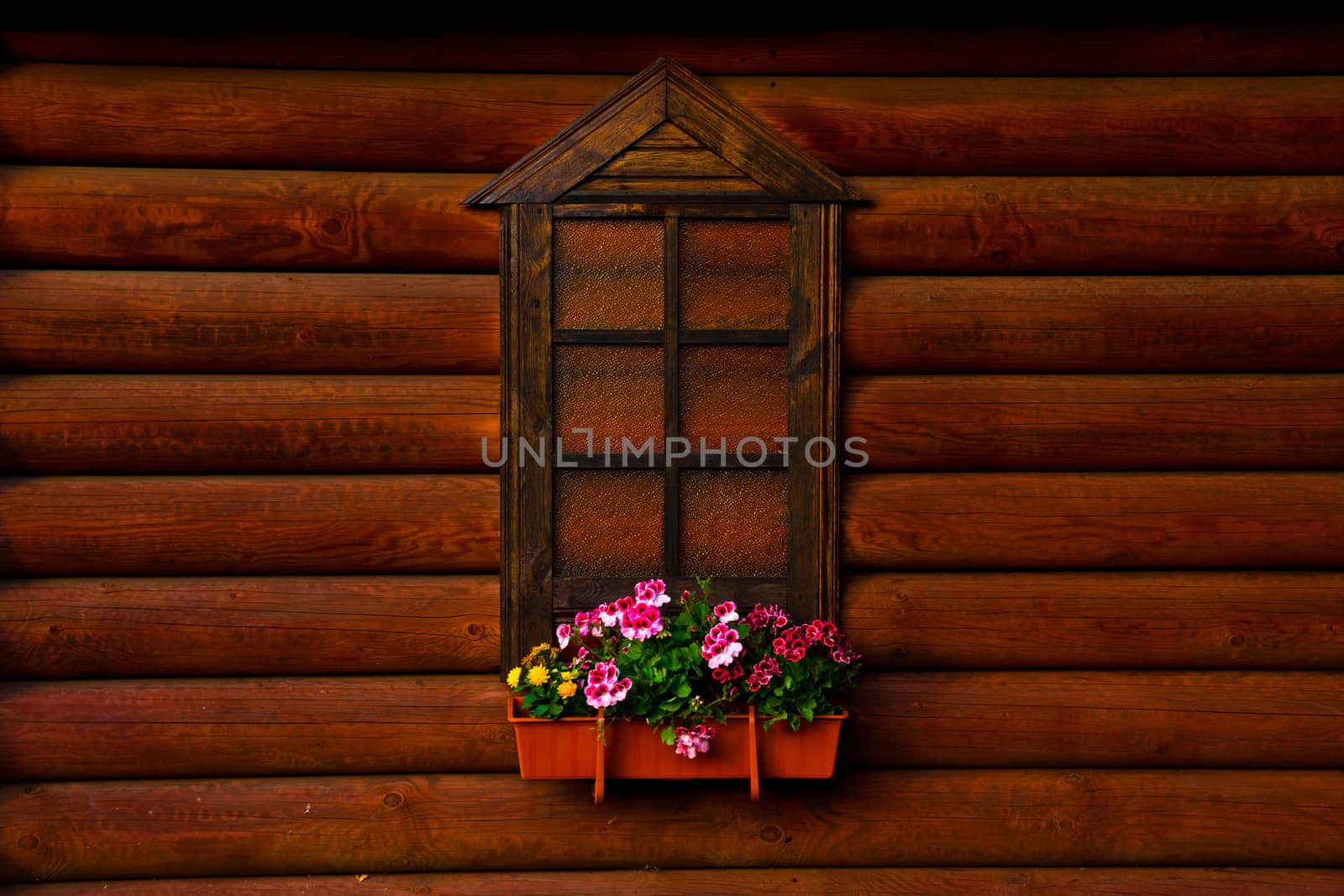 wall of the wooden house with a window and flowers