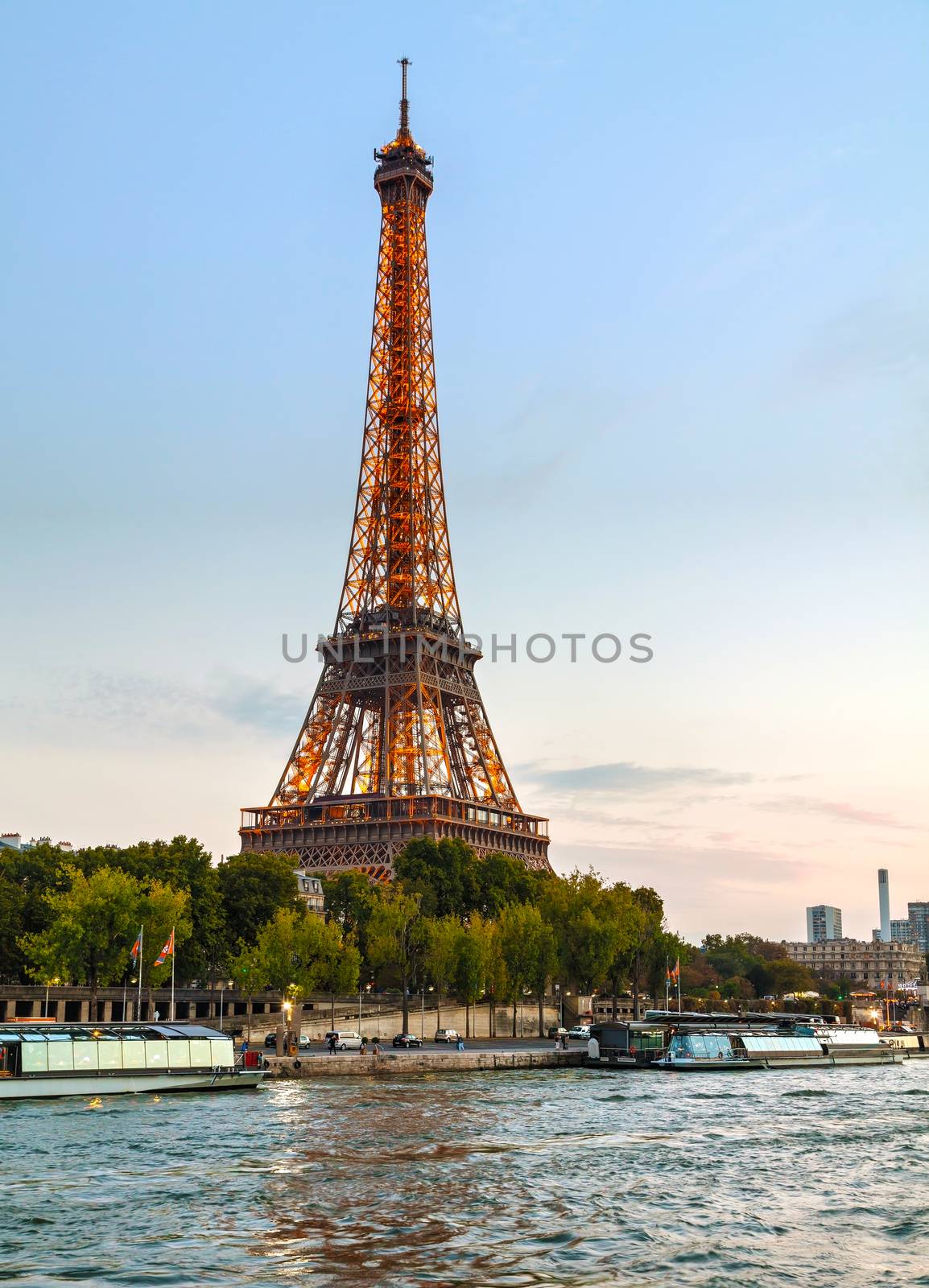 PARIS - OCTOBER 9: Paris cityscape with Eiffel tower on October 9, 2014 in Paris, France. It's an iron lattice tower located on the Champ de Mars and  was named after the engineer Gustave Eiffel.