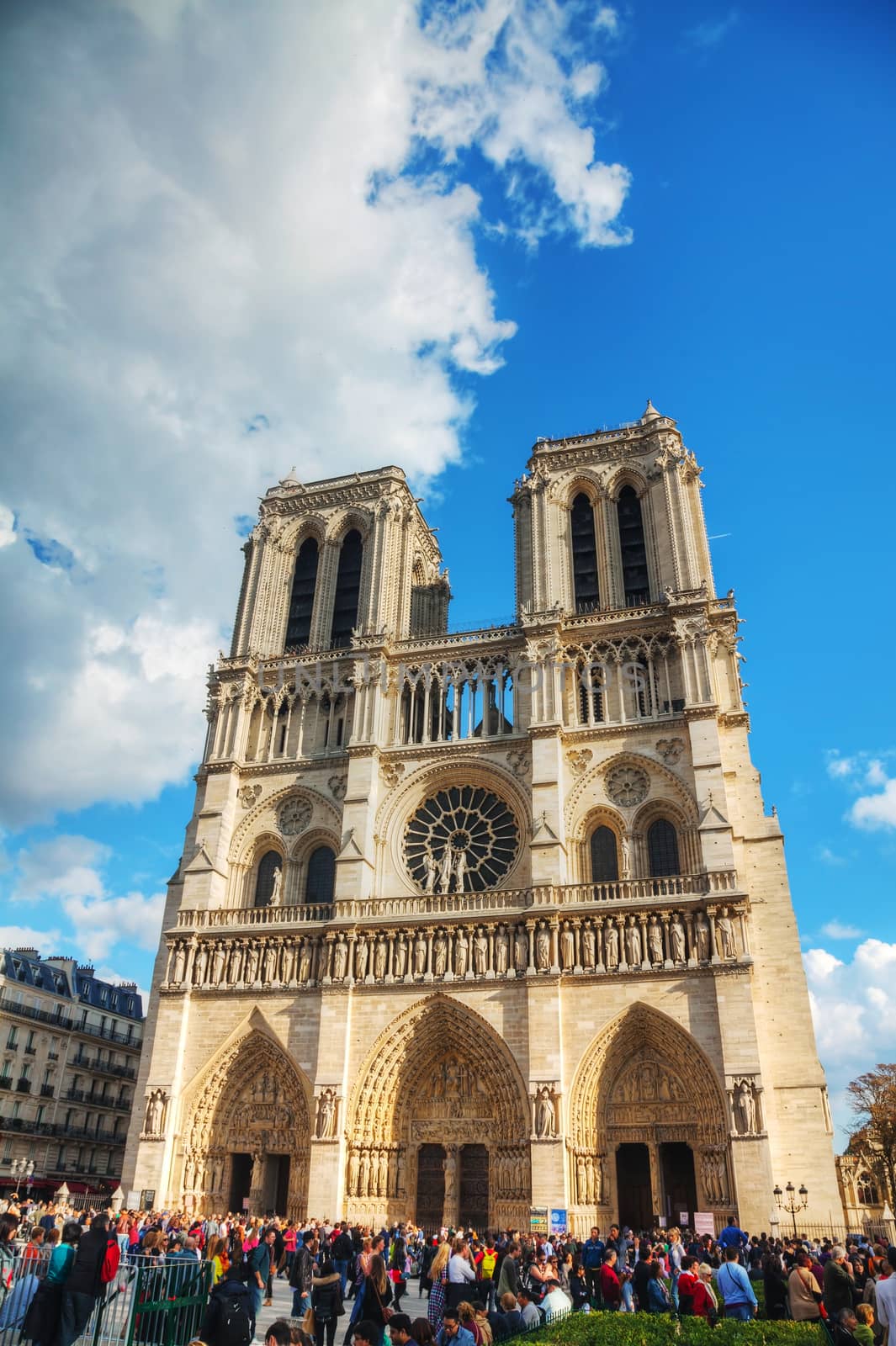 PARIS - OCTOBER 11: Notre Dame de Paris cathedral on October 11, 2014 in Paris, France. It's the finest example of French Gothic architecture and the largest and most well-known church buildings in the world.