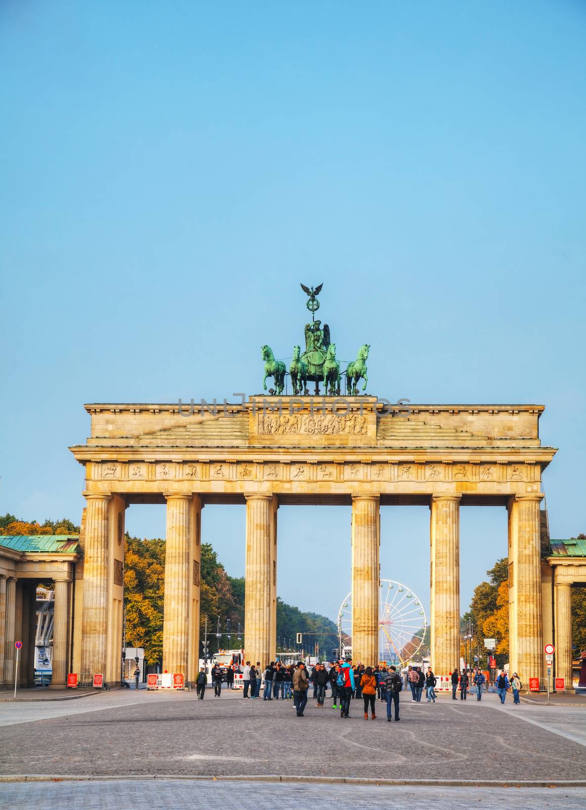 BERLIN - OCTOBER 3: Brandenburg gate (Brandenburger Tor) on October 3, 2014 in Berlin, Germany. It's an 18th-century neoclassical triumphal arch in Berlin, one of the best-known landmarks of Germany.