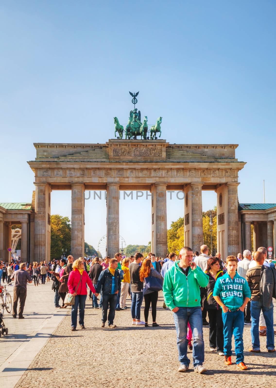 BERLIN - OCTOBER 4: Brandenburg gate (Brandenburger Tor) on October 4, 2014 in Berlin, Germany. It's an 18th-century neoclassical triumphal arch in Berlin, one of the best-known landmarks of Germany.