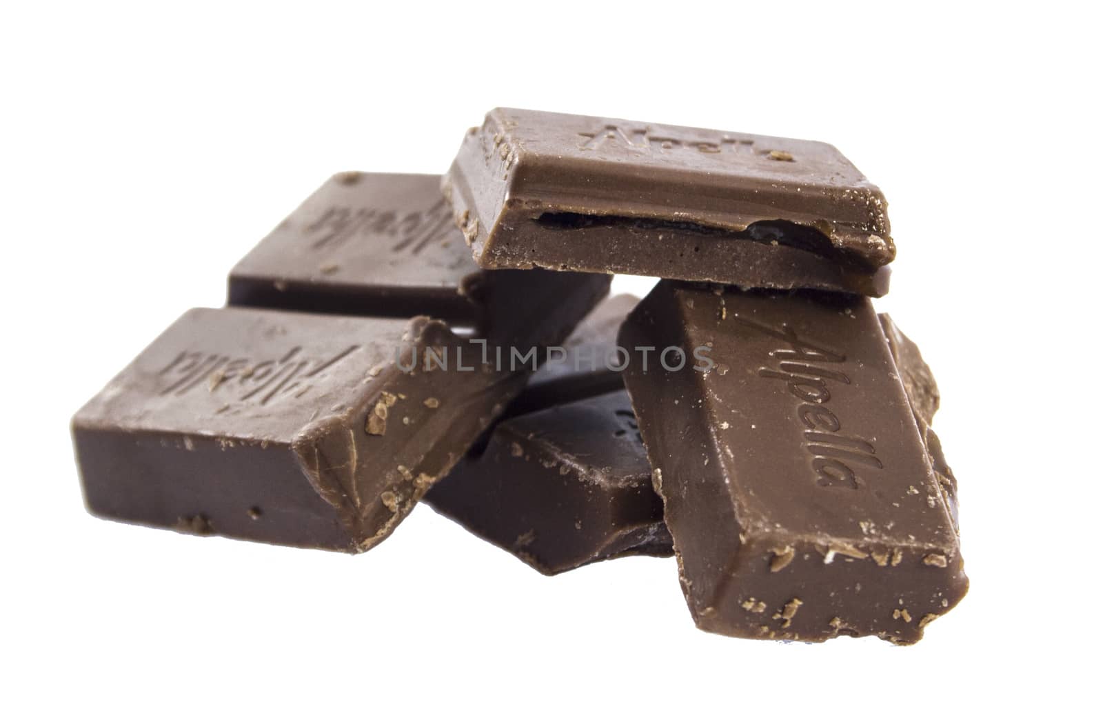 Closeup of chocolate bar isolated on white.