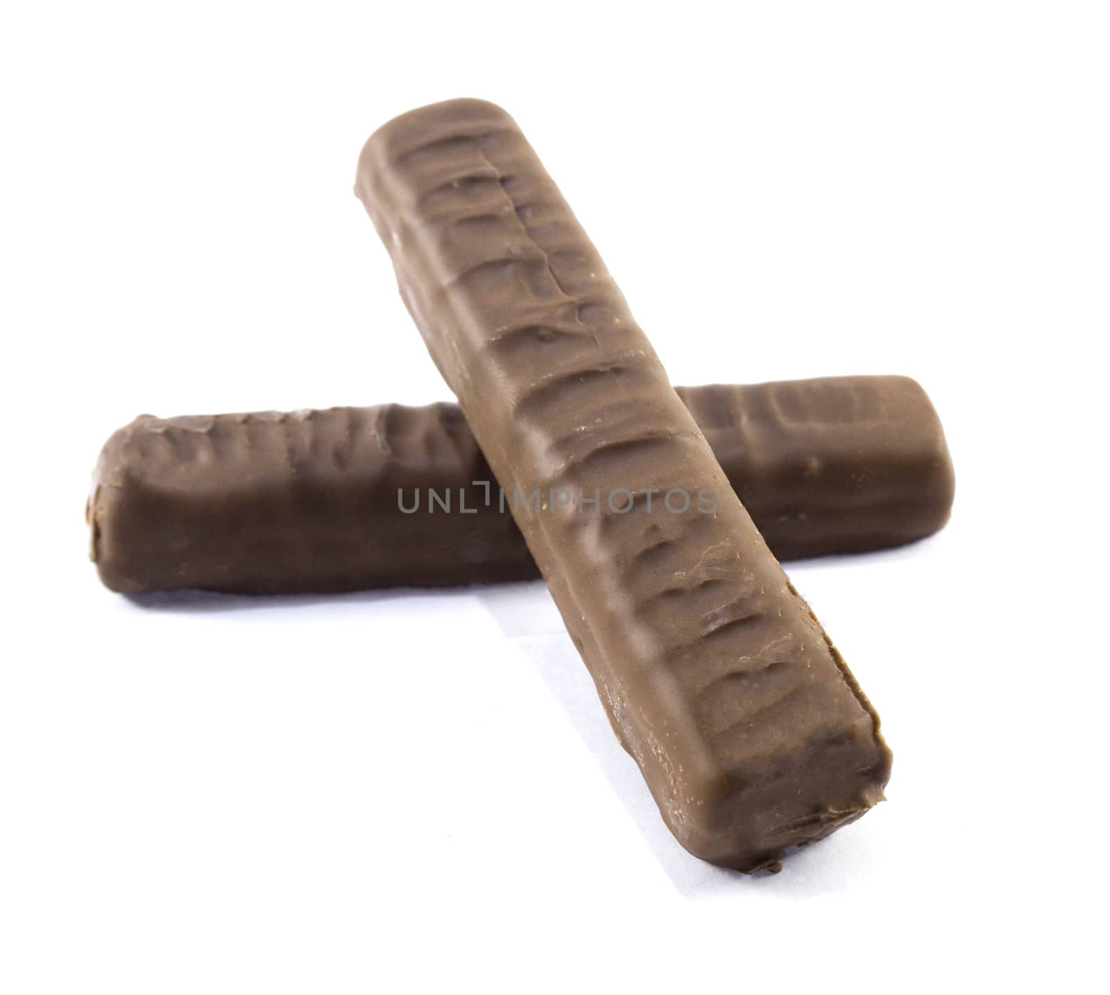 Closeup of chocolate bar isolated on white.