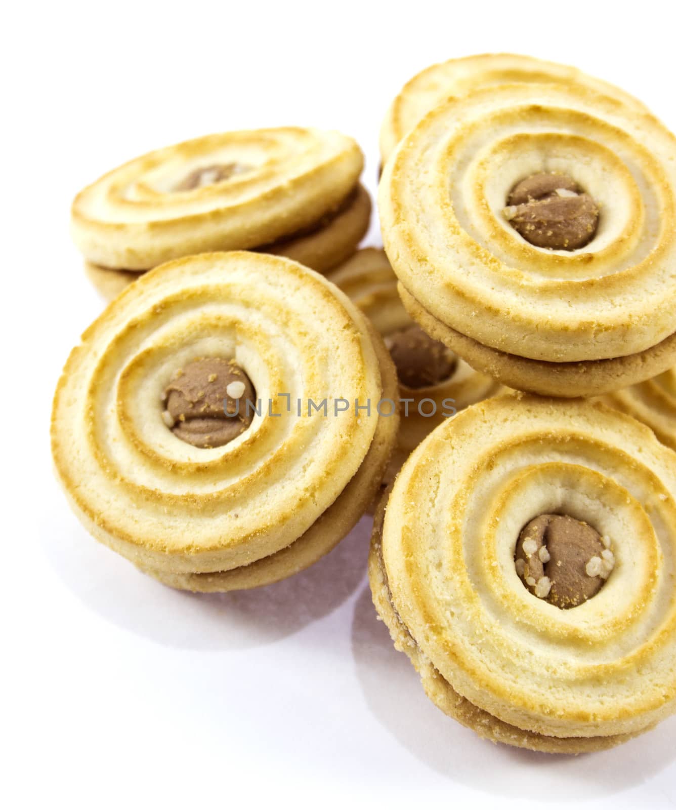 Sandwich biscuits, filled with chocolate, isolated on white background