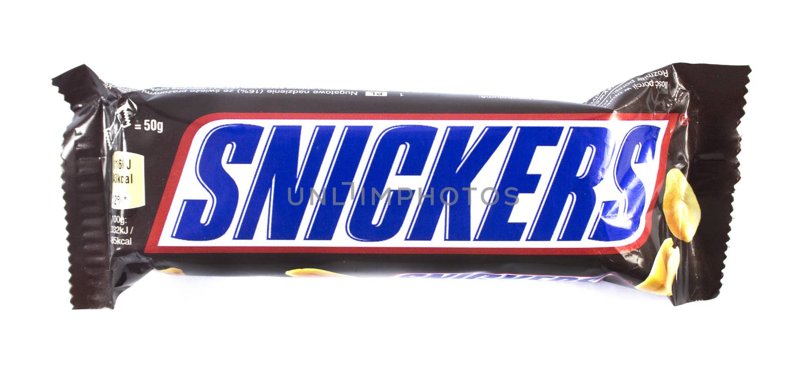 Amman, Jordan - December 5, 2014: Snickers chocolate bar isolated on white background. Snickers chocolate bar made by Mars, Incorporated.