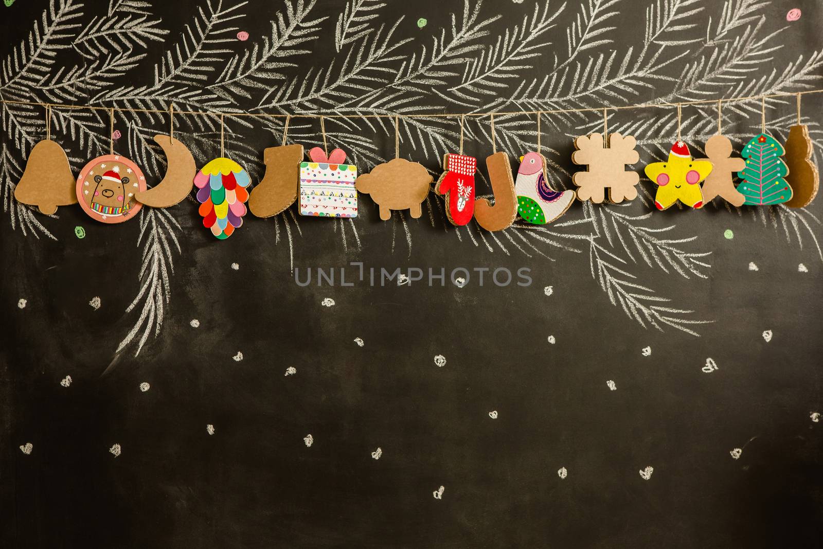 Cardboard toys for the Christmas tree or Christmas garland. Christmas decorations. Selective Focus