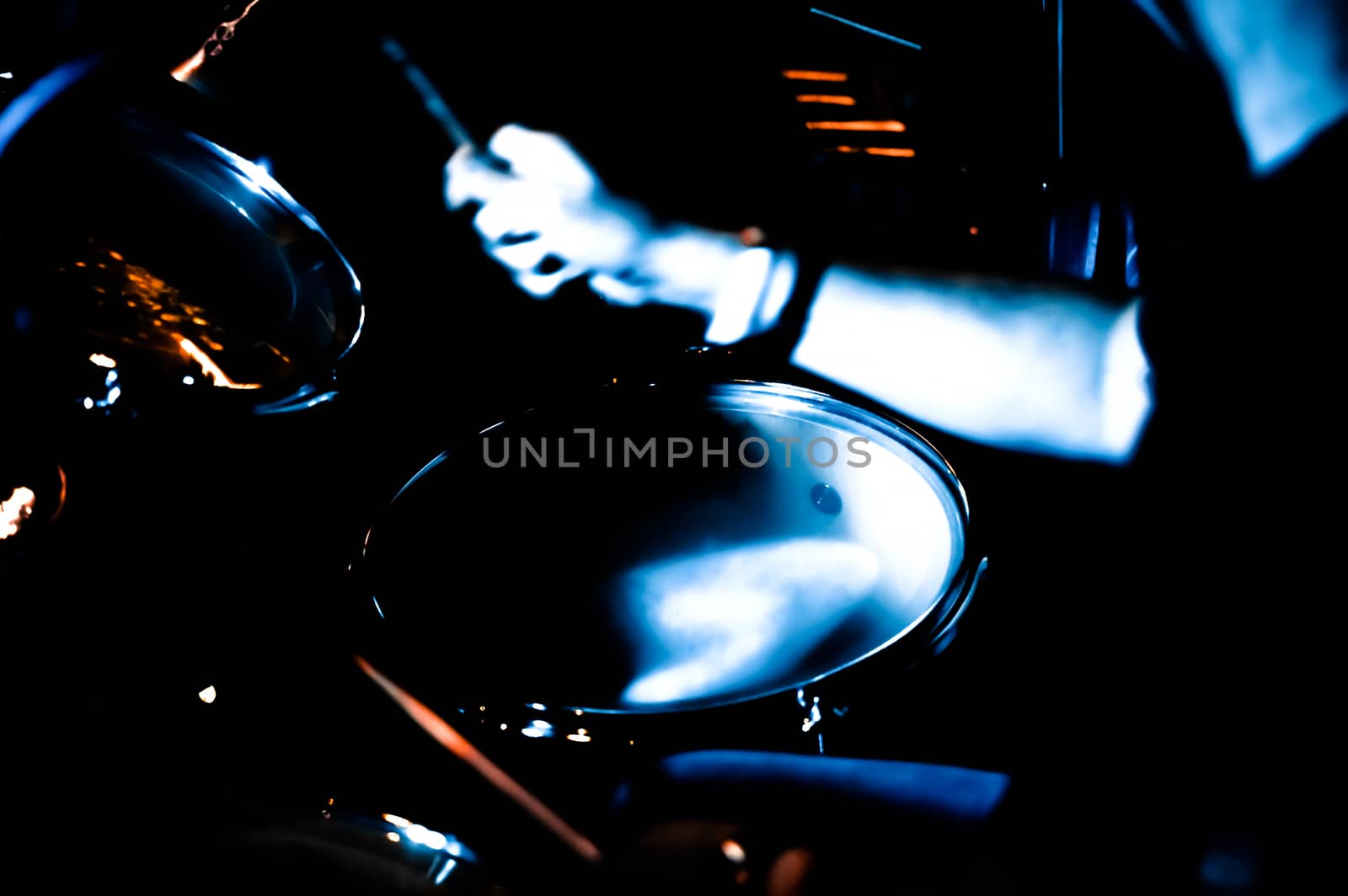 motion blur anstract of a musician the playing drums