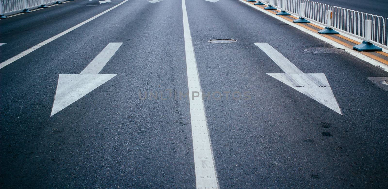 Arrow on the  road in the city