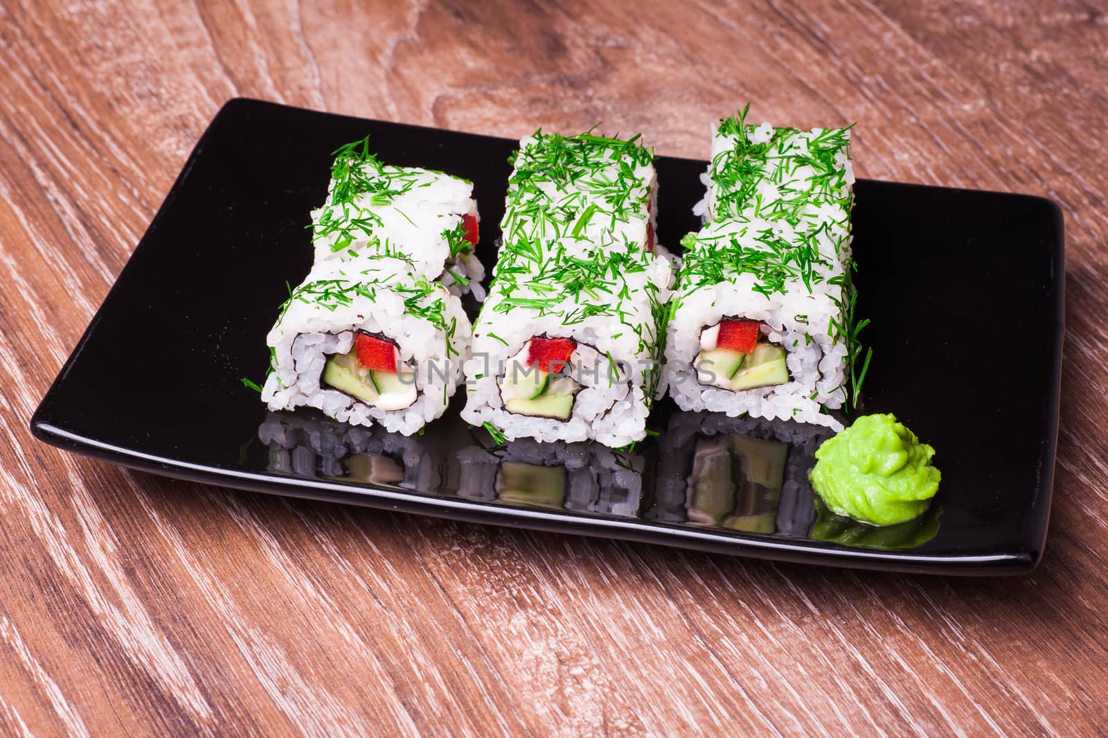 vegetarian sushi set roll on wooden background