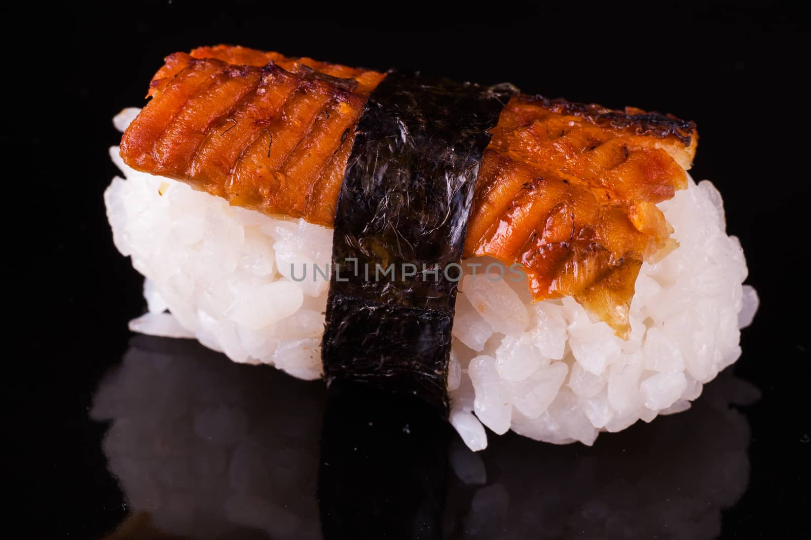 eel nigiri isolated on isolated black background 