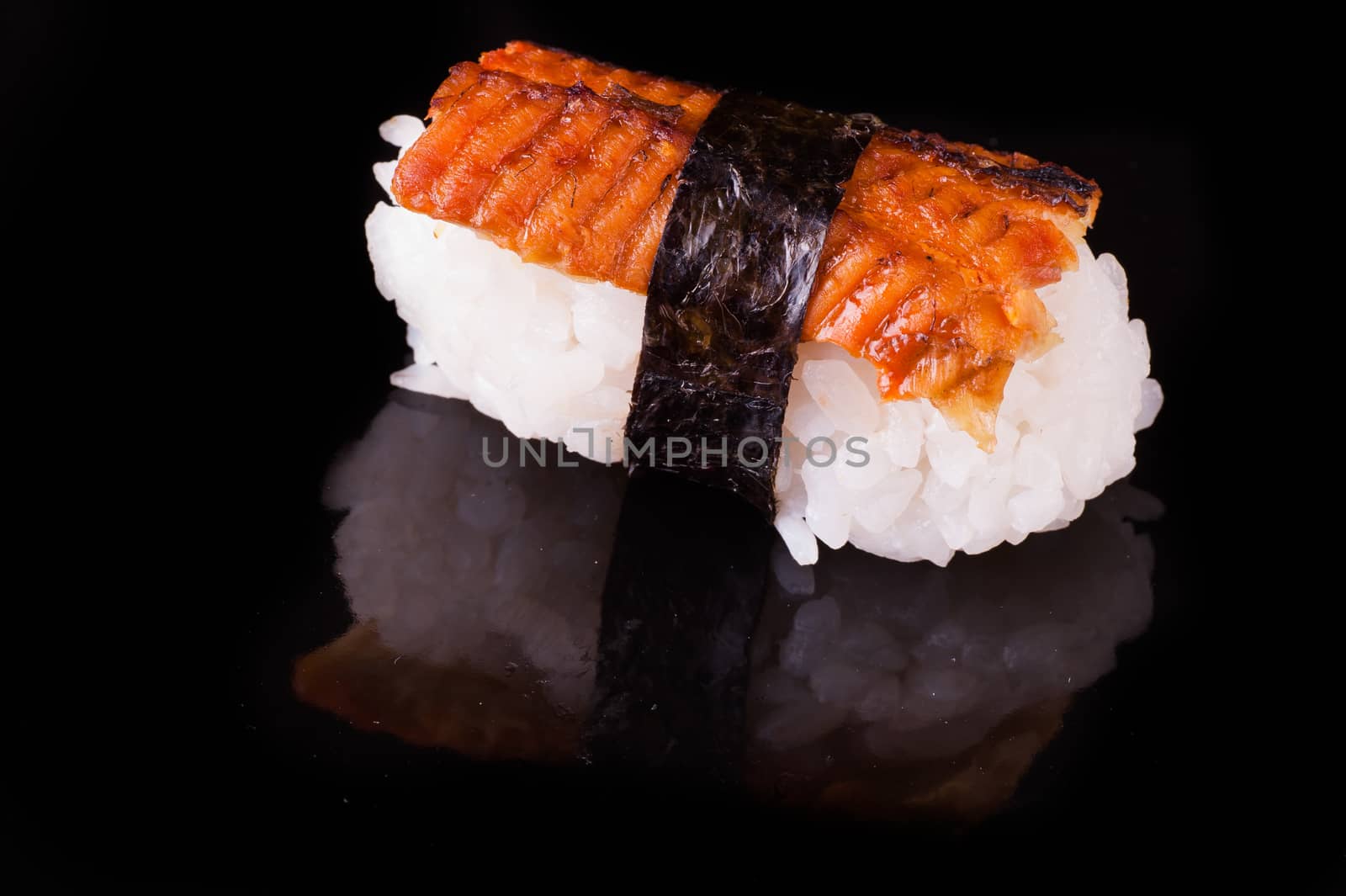 eel nigiri isolated on isolated black background 