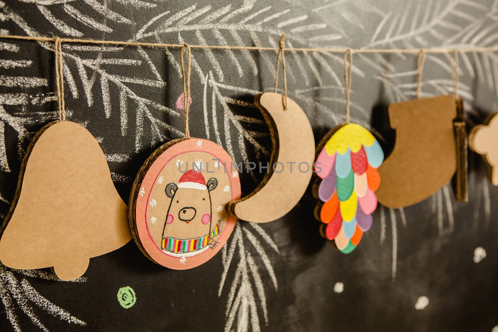 Cardboard toys for the Christmas tree or garland. Creative decorations. Selective Focus by sarymsakov