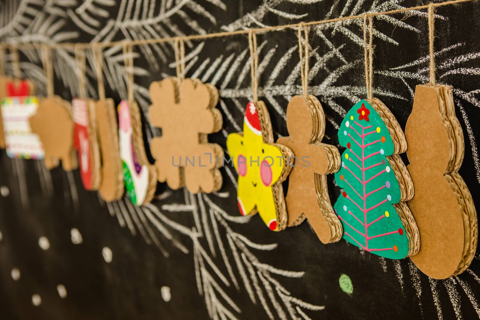 Cardboard toys for the Christmas tree or garland. Creative decorations. Selective Focus by sarymsakov