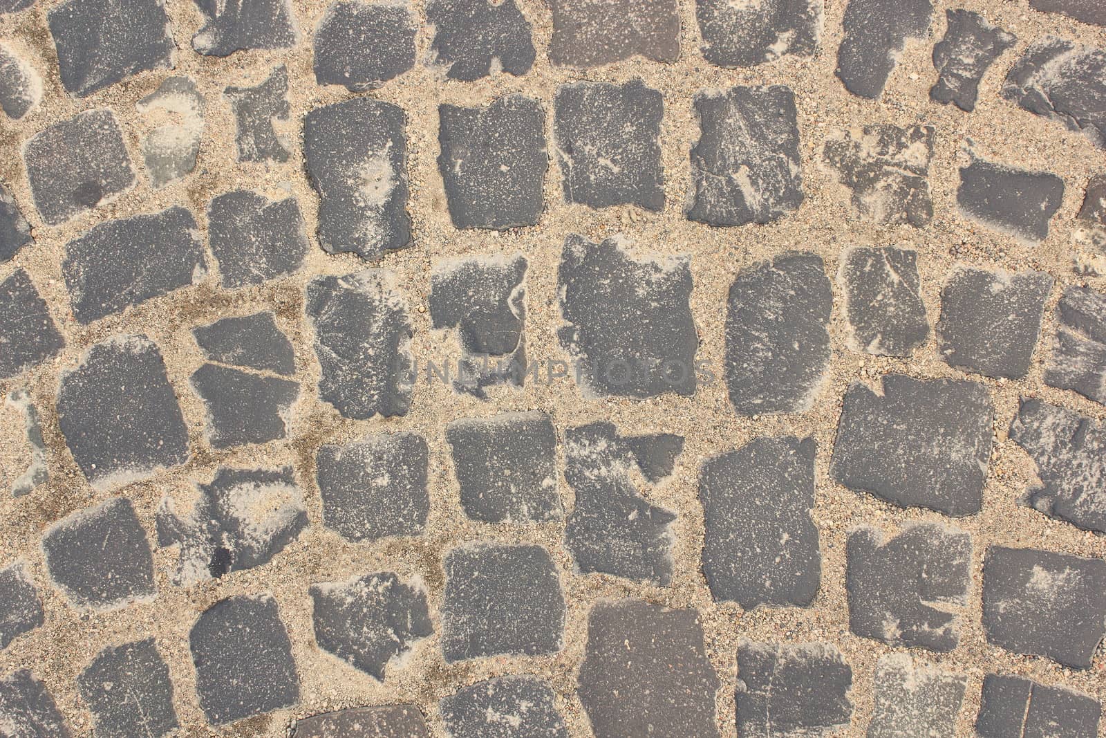 real stone pavement texture on urban pedestrian path