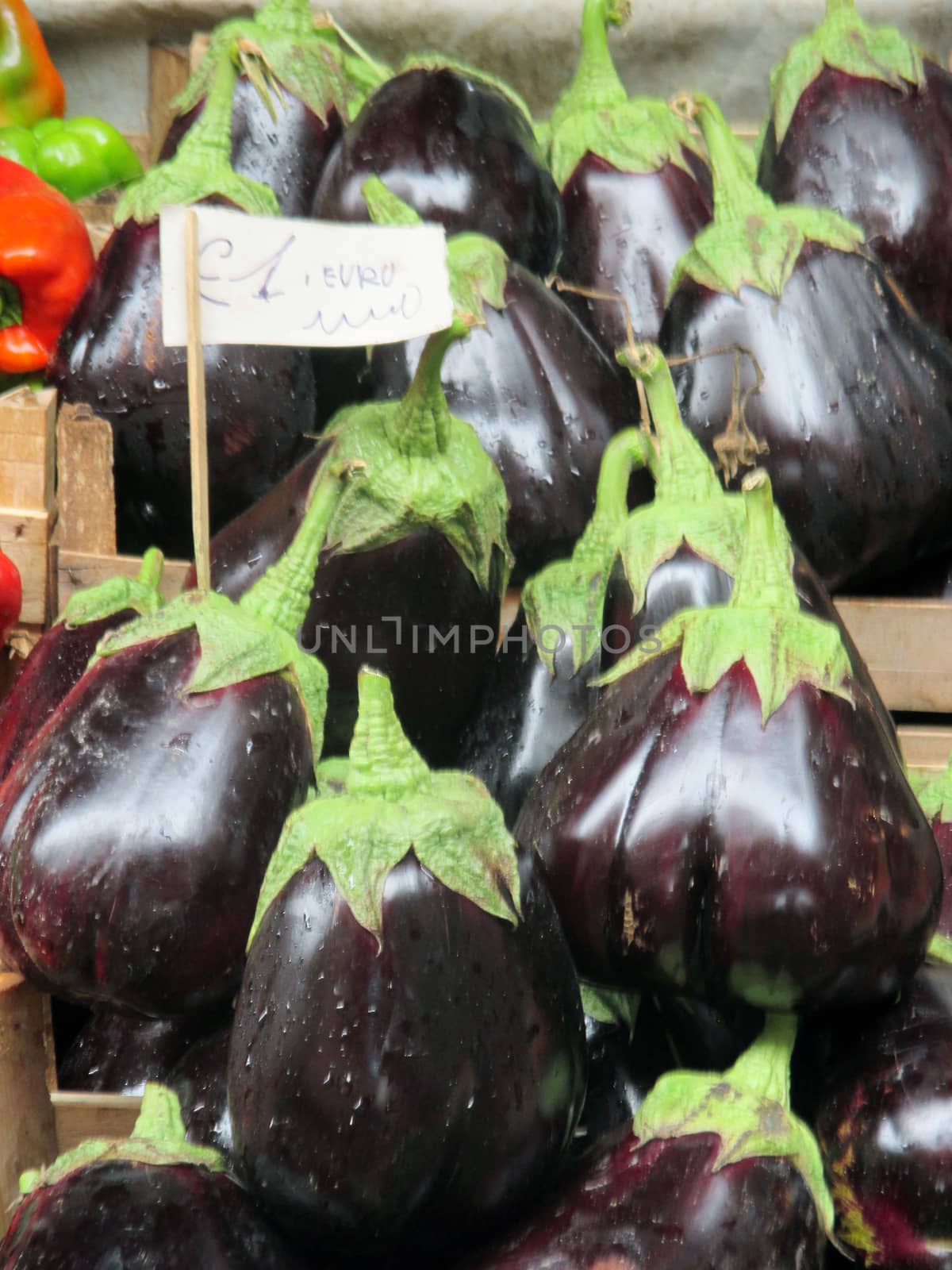 Beautiful fresh eggplant on the counter by mcherevan