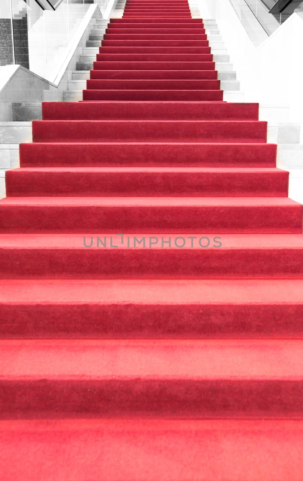Red carpet on stairs by anderm