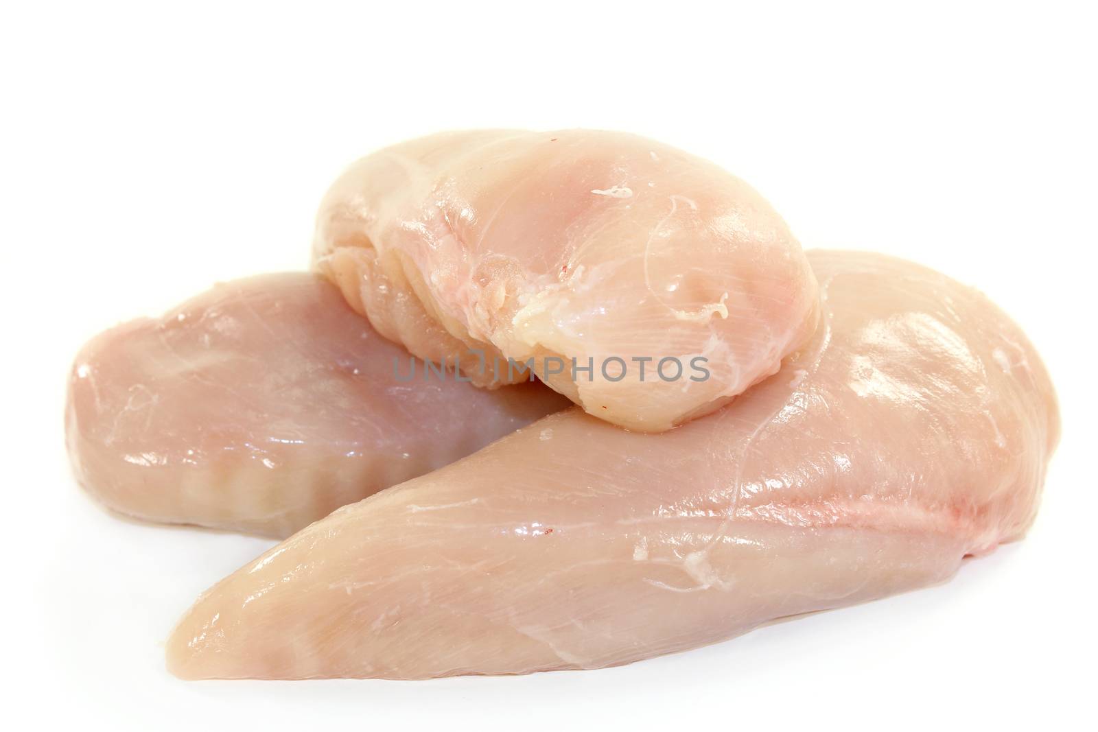 chicken breast fillet by silencefoto