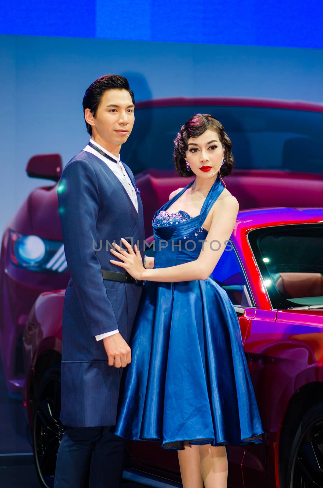 NONTHABURI - NOVEMBER 29: Ford Mustang car with unidentified model on display at Thailand International Motor Expo 2014 on November 29, 2014 in Nonthaburi, Thailand.