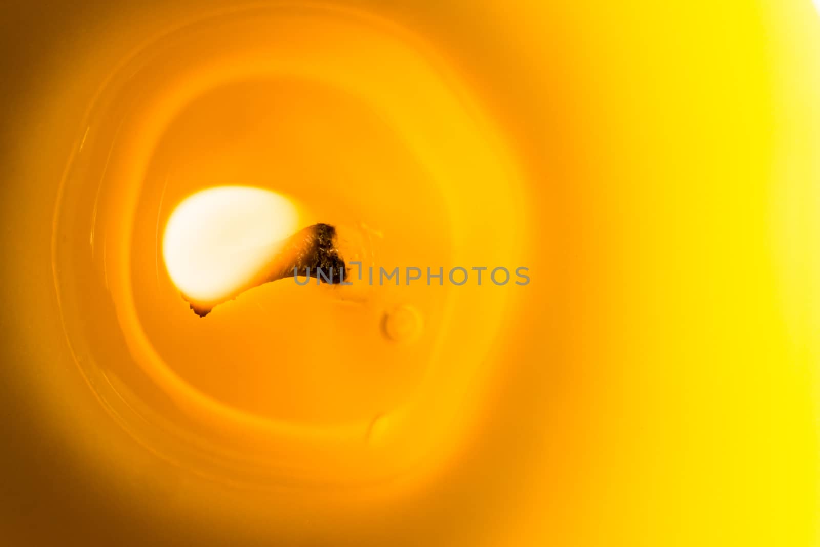 Citronella candle burning and photographed real close from the top.