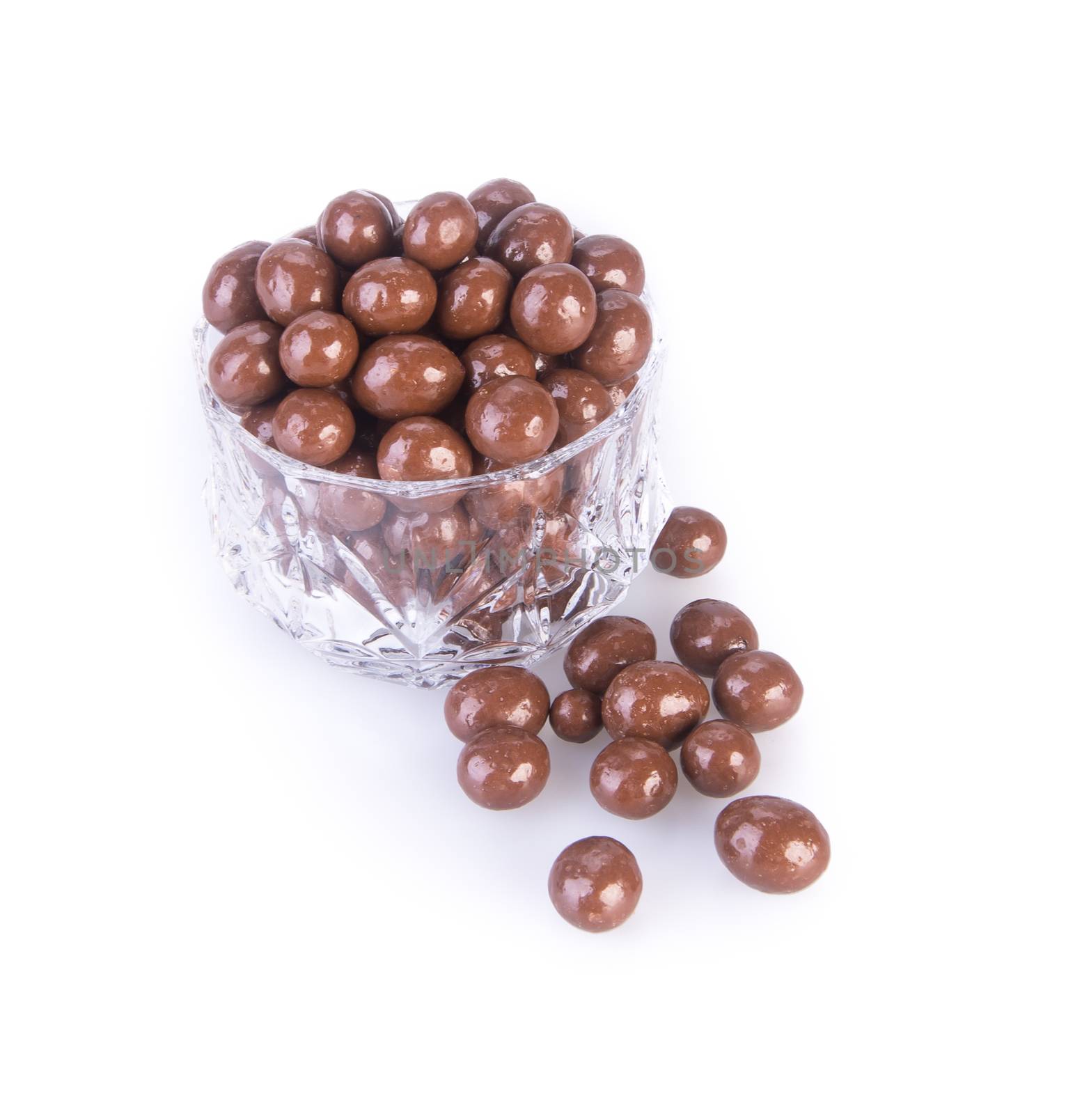 chocolate balls. chocolate balls in bowl on a background.