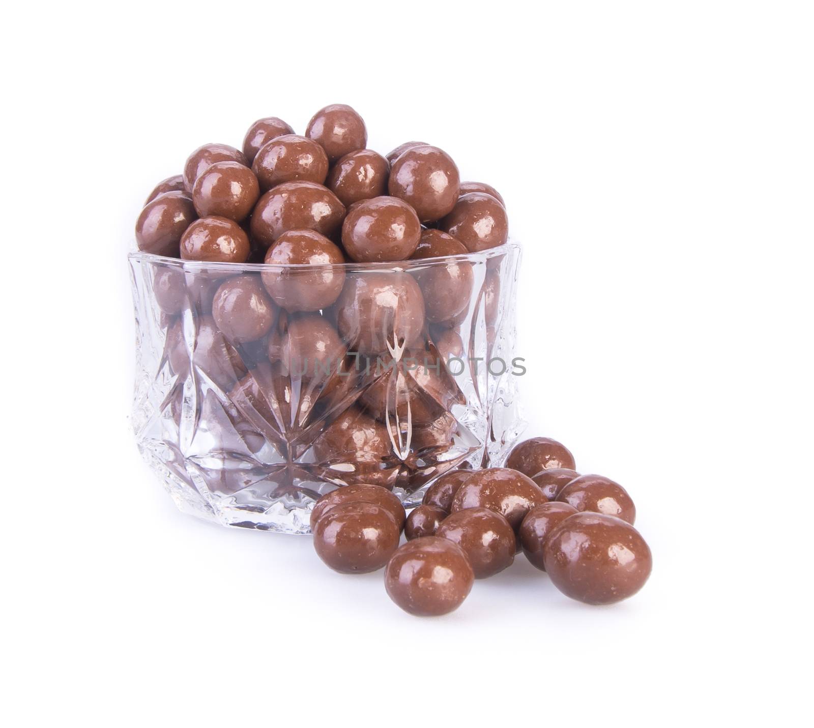 chocolate balls. chocolate balls in bowl on a background.