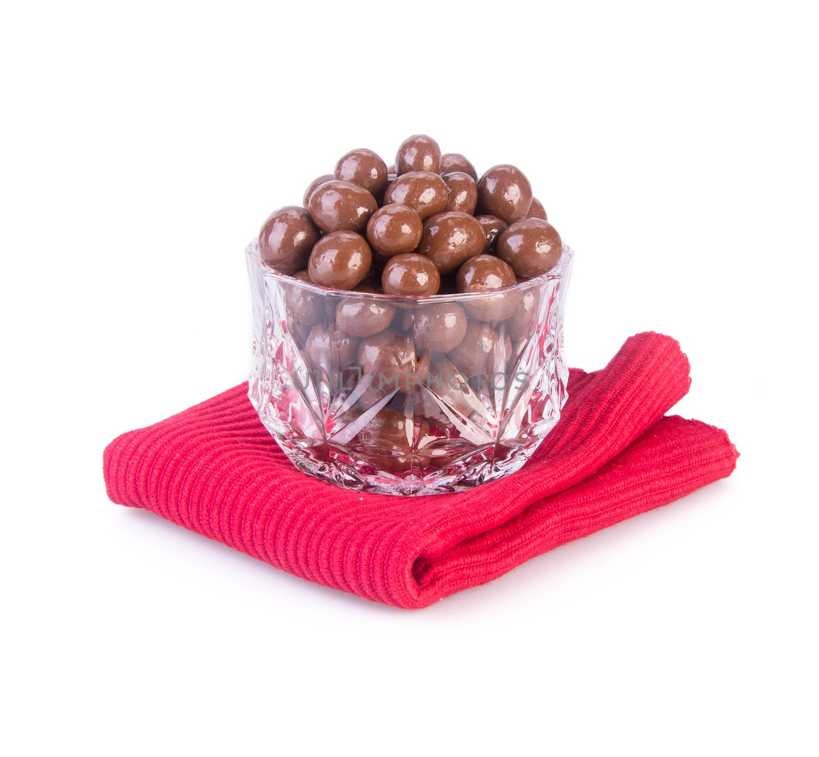 chocolate balls. chocolate balls in bowl on a background.