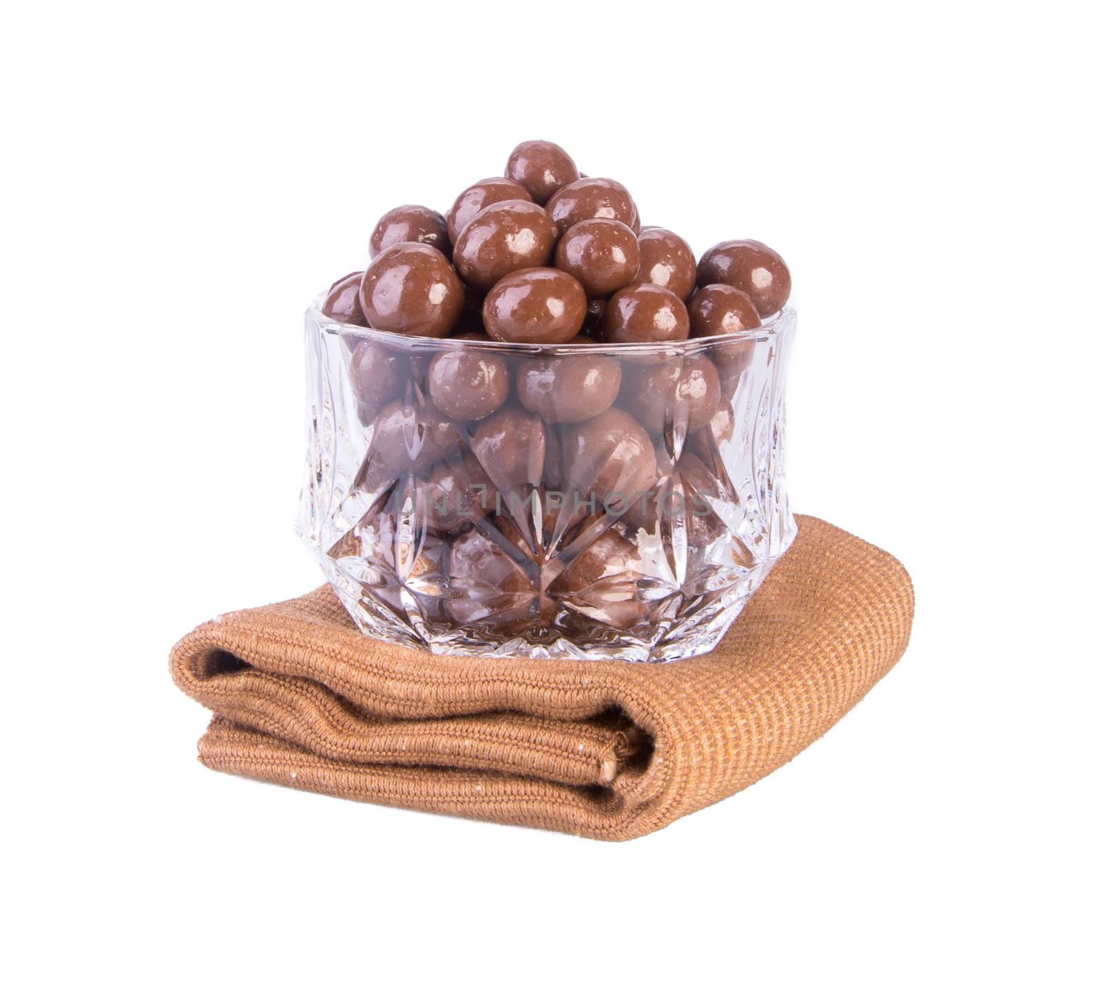 chocolate balls. chocolate balls in bowl on a background.